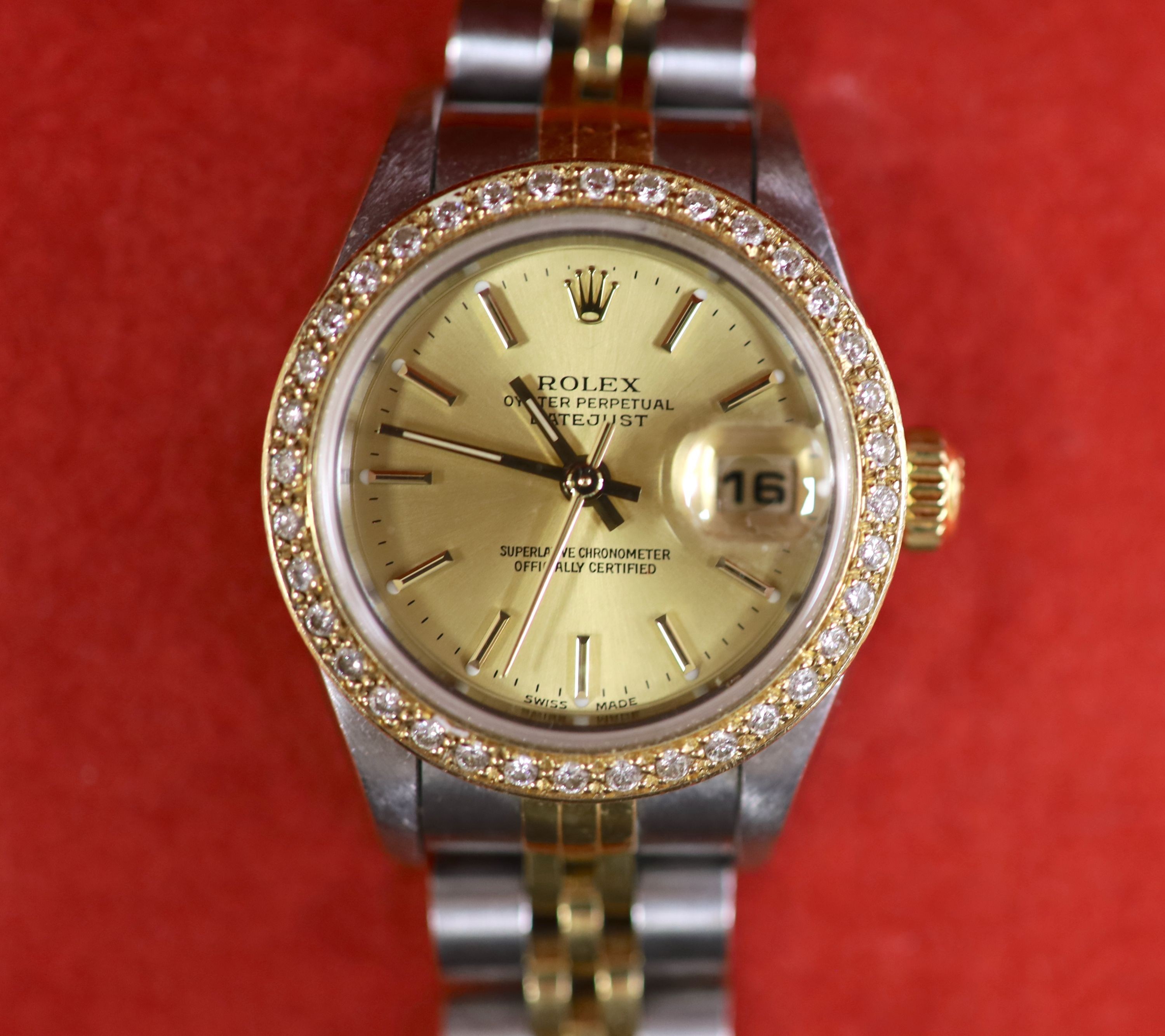 A lady's 2002 stainless steel and gold Rolex Oyster Perpetual Datejust wrist watch, with diamond set bezel, case diameter 26mm